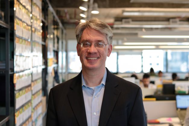 A headshot of a member of staff