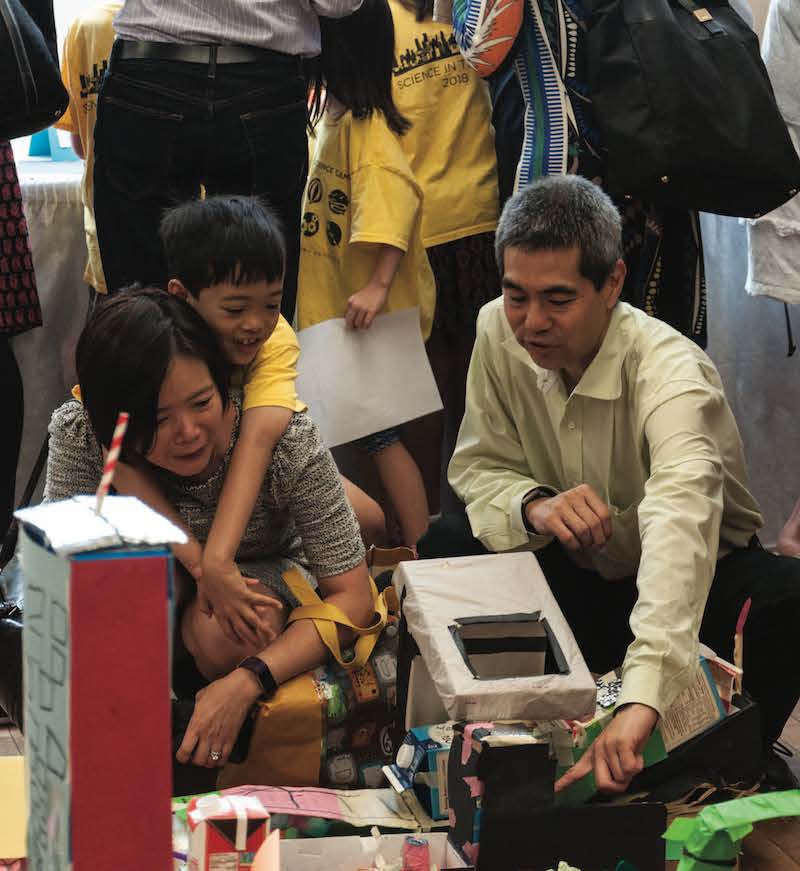 Family attends the showcase of student projects