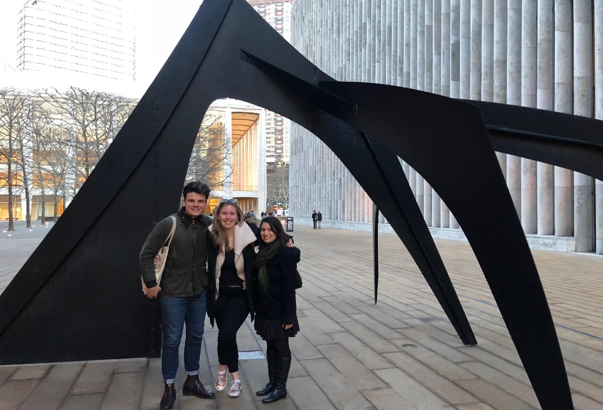 ARAD students pose in front of a metal sculpture in mid-town NYC