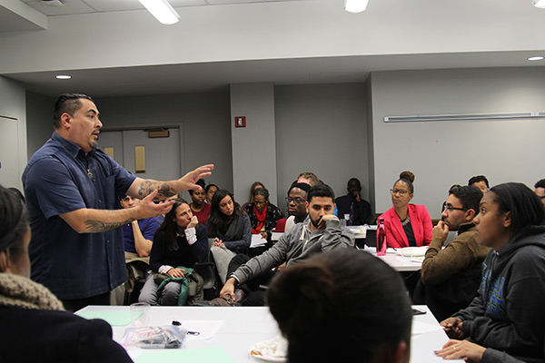 Human rights activist Cesar Cruz speaks at the TC Racial Literacy Roundtable in December.