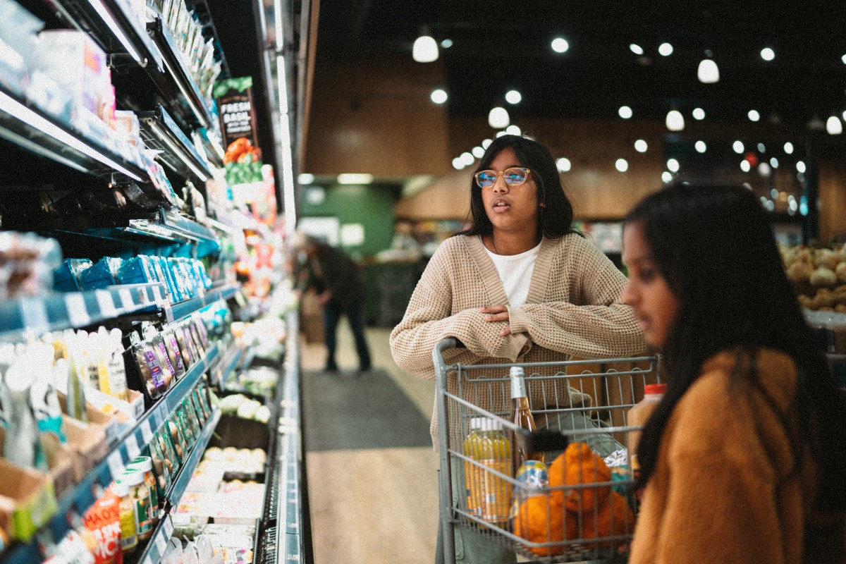Pictured: Shopping at grocery store.
