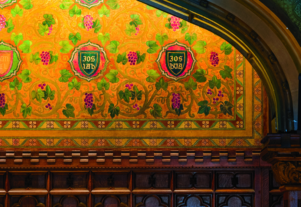 Oak wainscoting, Milbank Chapel’s east wall; green and gold paper by Tiffany Glass and Decorating Company. Former TC Trustee President William Potter oversaw construction of Collegiate Gothic-style Milbank, Main Hall and more.