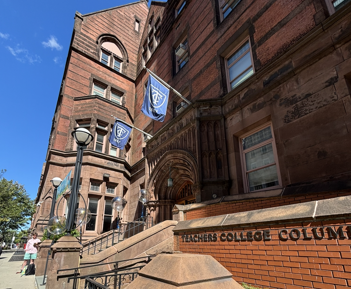 The main entrance of Teachers College on a sunny day.