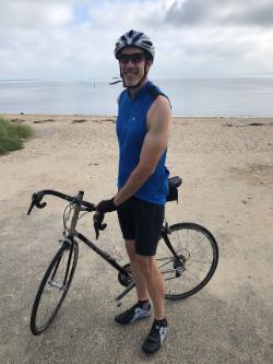 Dr. Brock While Cycling (Photo Courtesy of Dr. Brock)