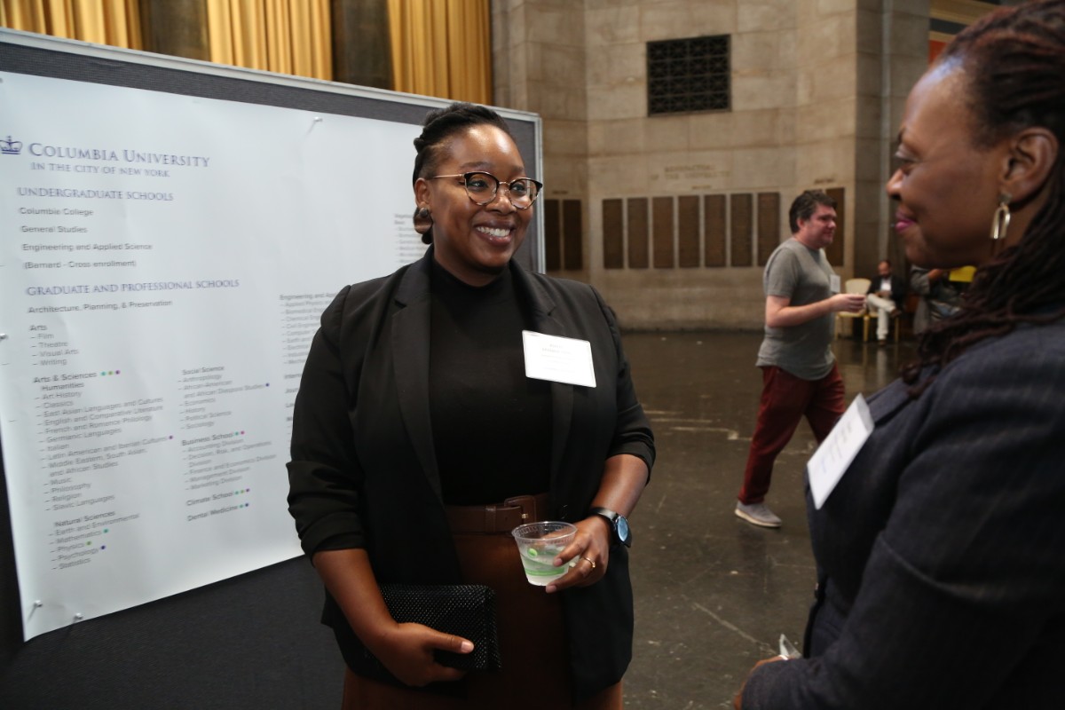 Poster Session, CU Prof. Ashley Graham-Perel (left) and TC Prof. Yolanda Sealey-Ruiz (Photo: Teachers College/Bruce Gilbert)