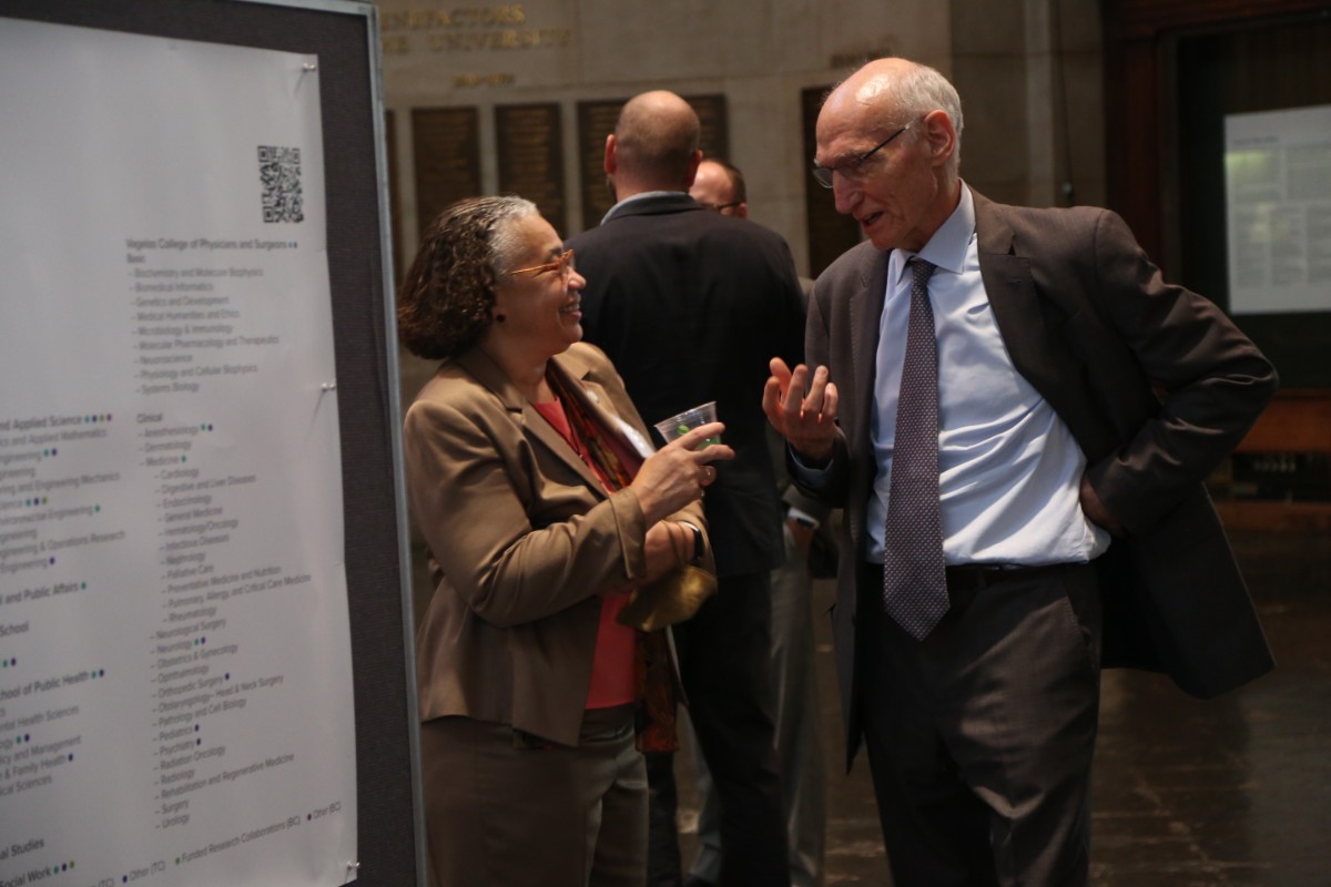 Poster Session, Teachers College Vice President for Diversity and Community Affairs Janice Robinson (left) and Teachers College President Thomas Bailey (Photo: Teachers College/Bruce Gilbert)