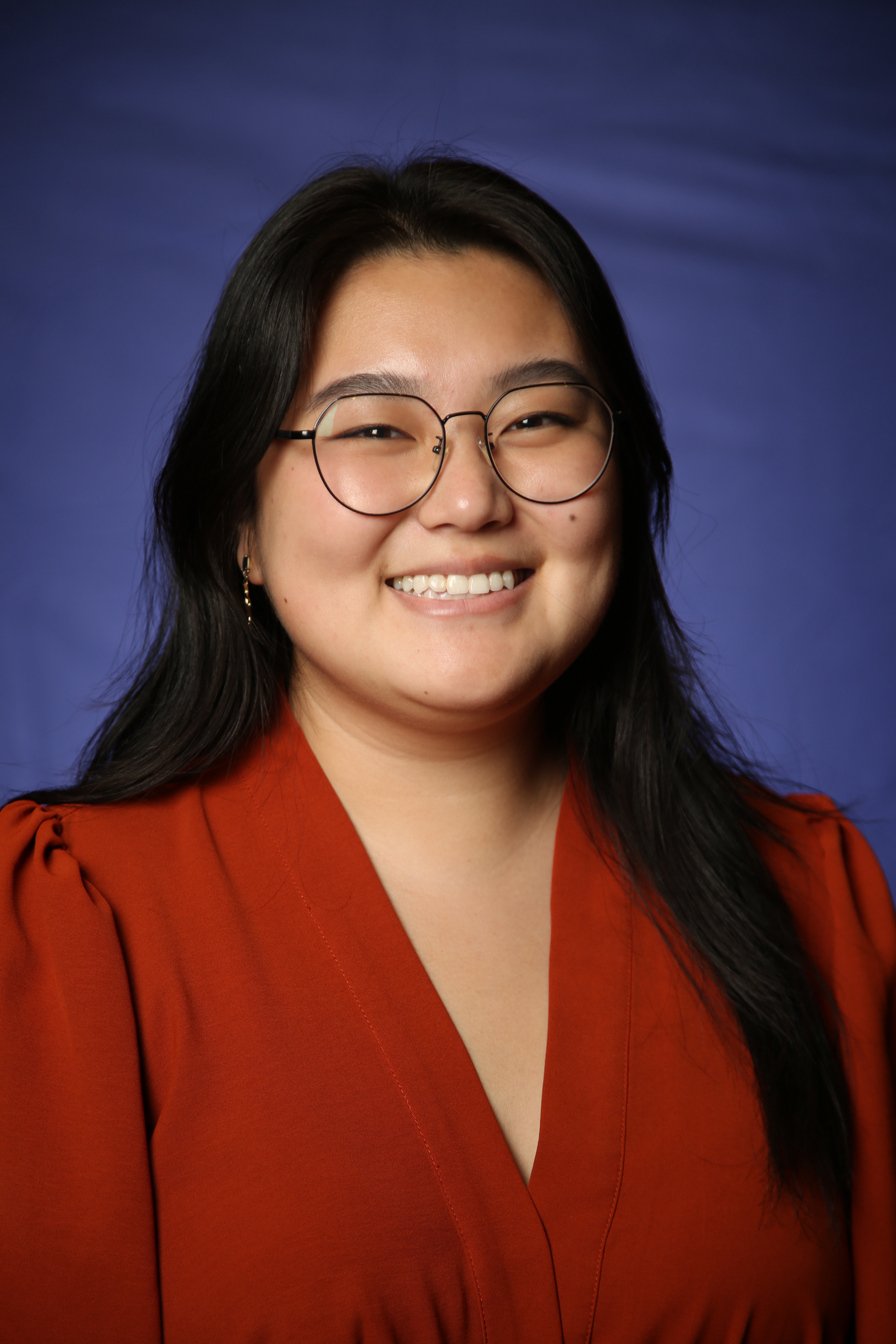 A photo headshot of a smiling Uyanga Mungunchimeg