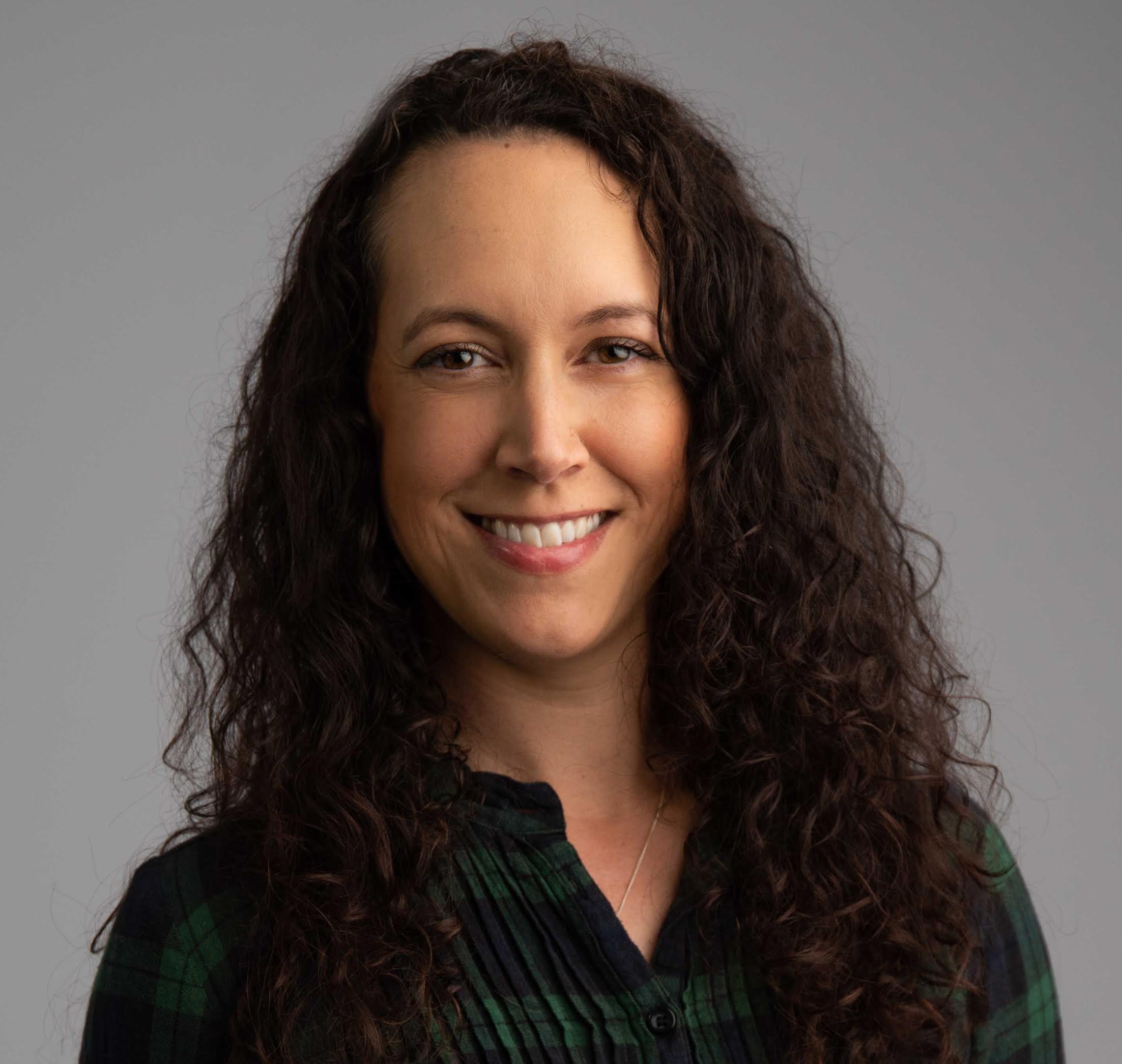 A headshot of Caroline