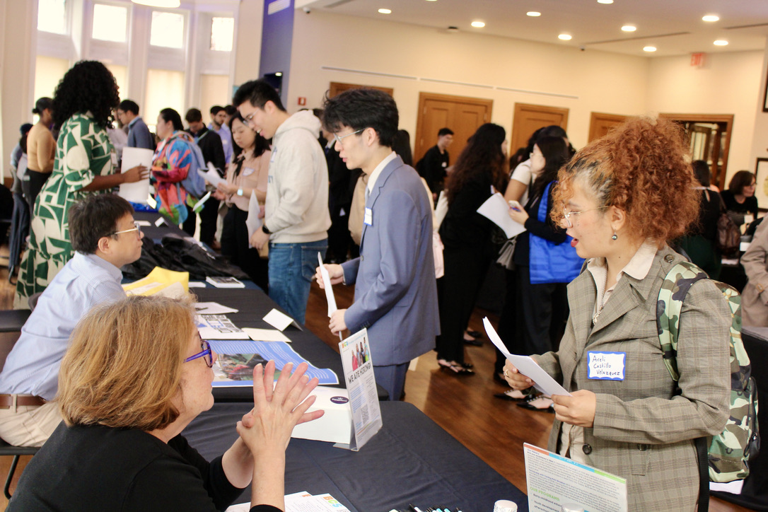Students and employers interacting at a TC NEXT Career Fair