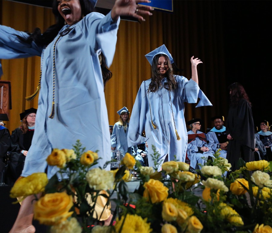 Students walking at graduation ceremony
