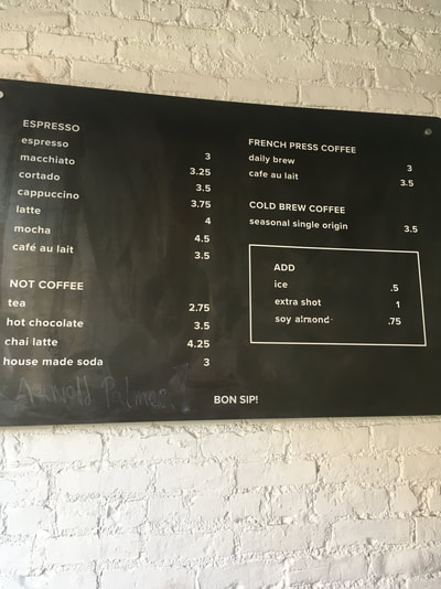 Coffee Menu set against a black background with small white lettering