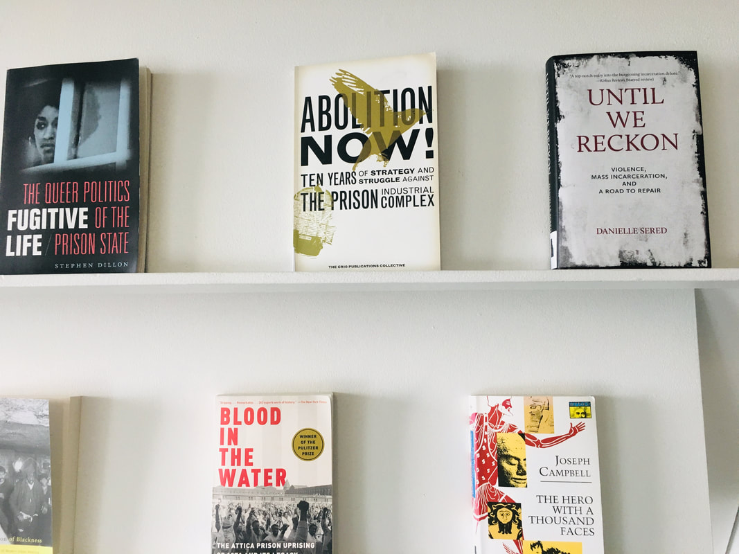 Close up of books from Mirror Echo Tilt resources