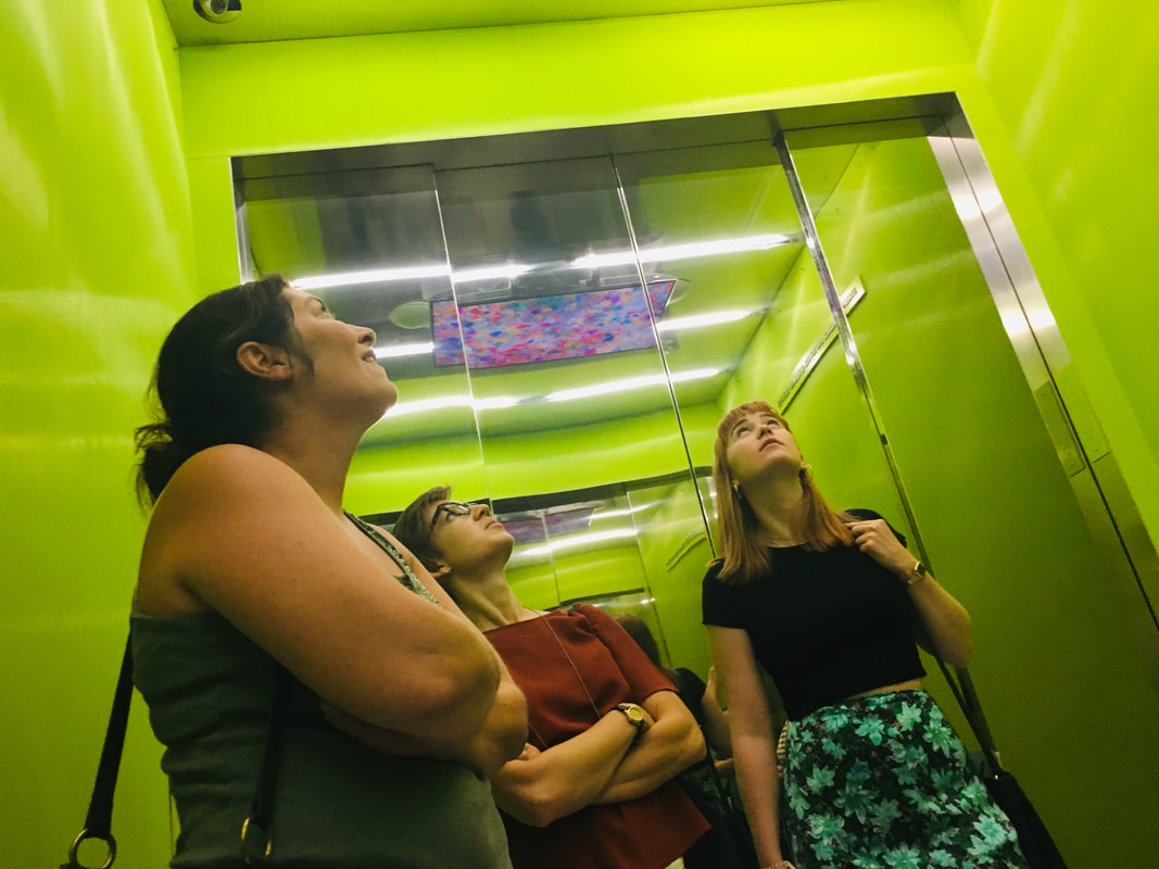 Three people starting upwards