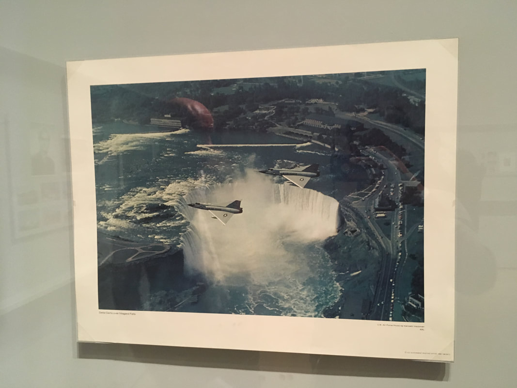 image of jets flying over waterfall