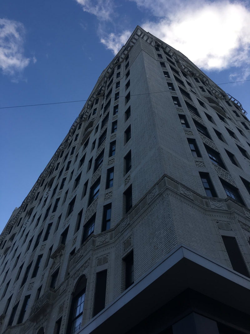 Side of a building with multiple small windows