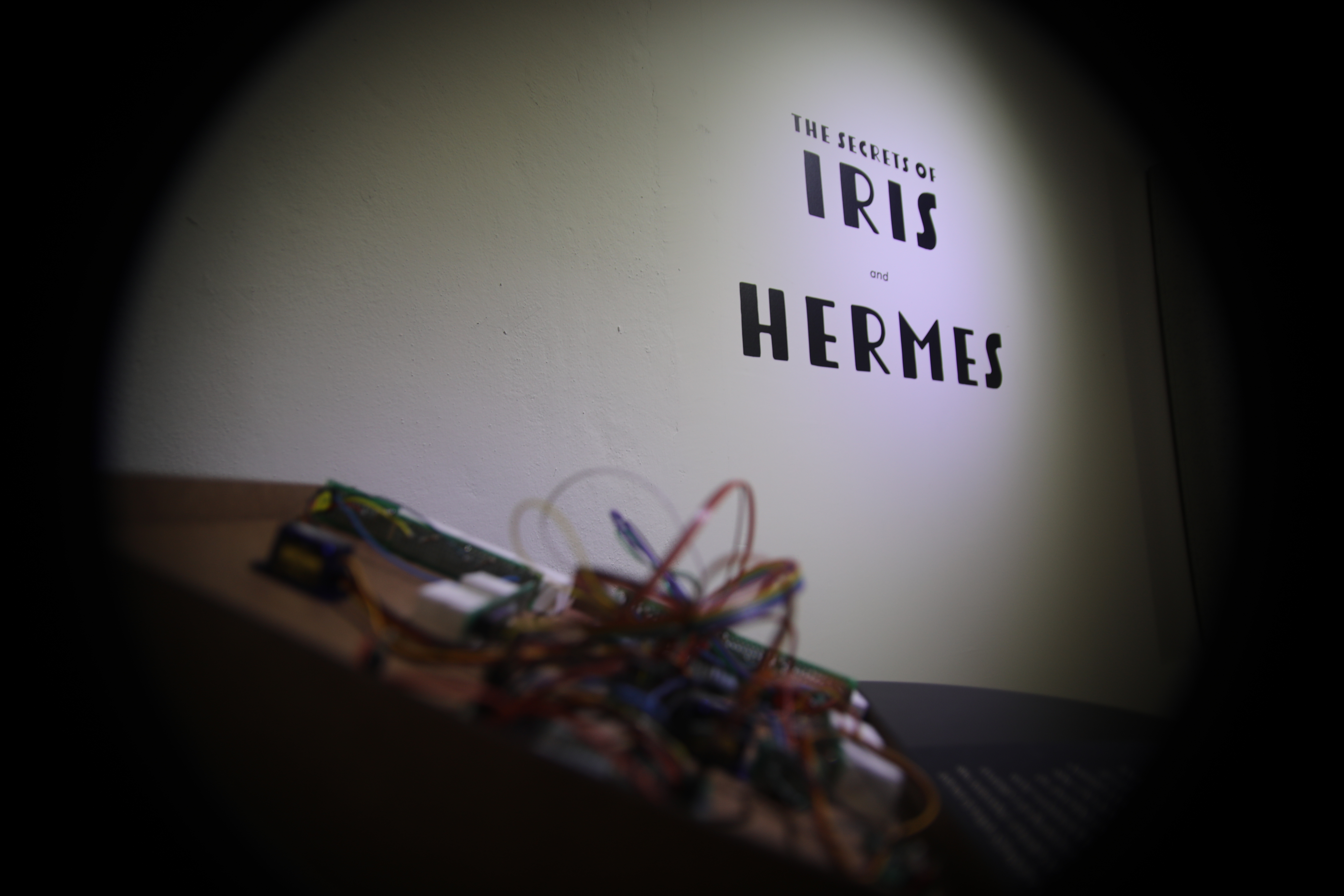 profile image of box with wires with title The secrets of Iris and Hermes in the background 