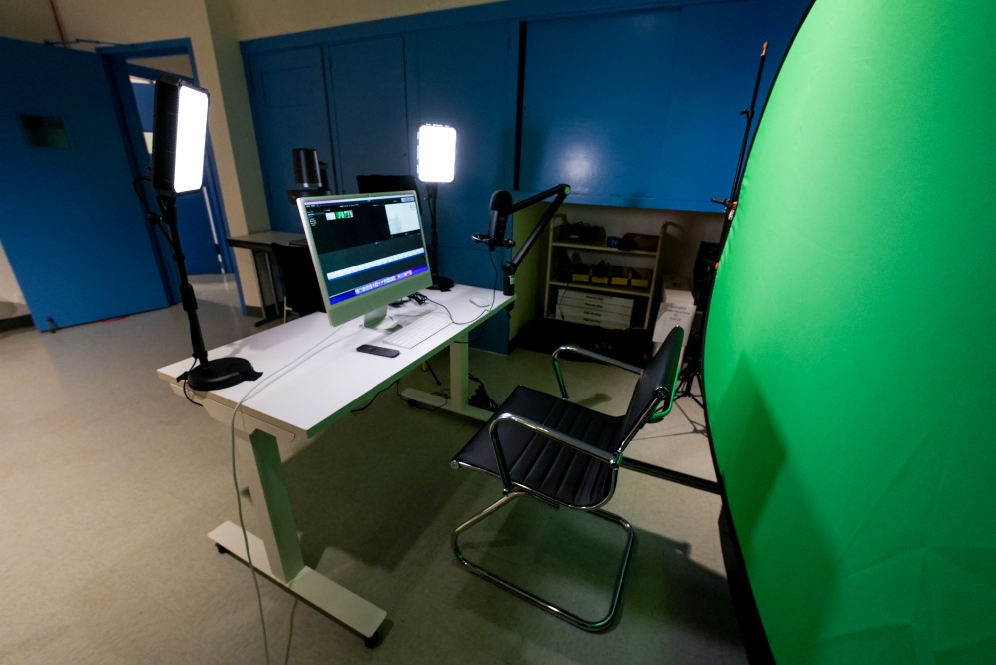 Studio B self service recording station iMac with lights microphone and greenscreen
