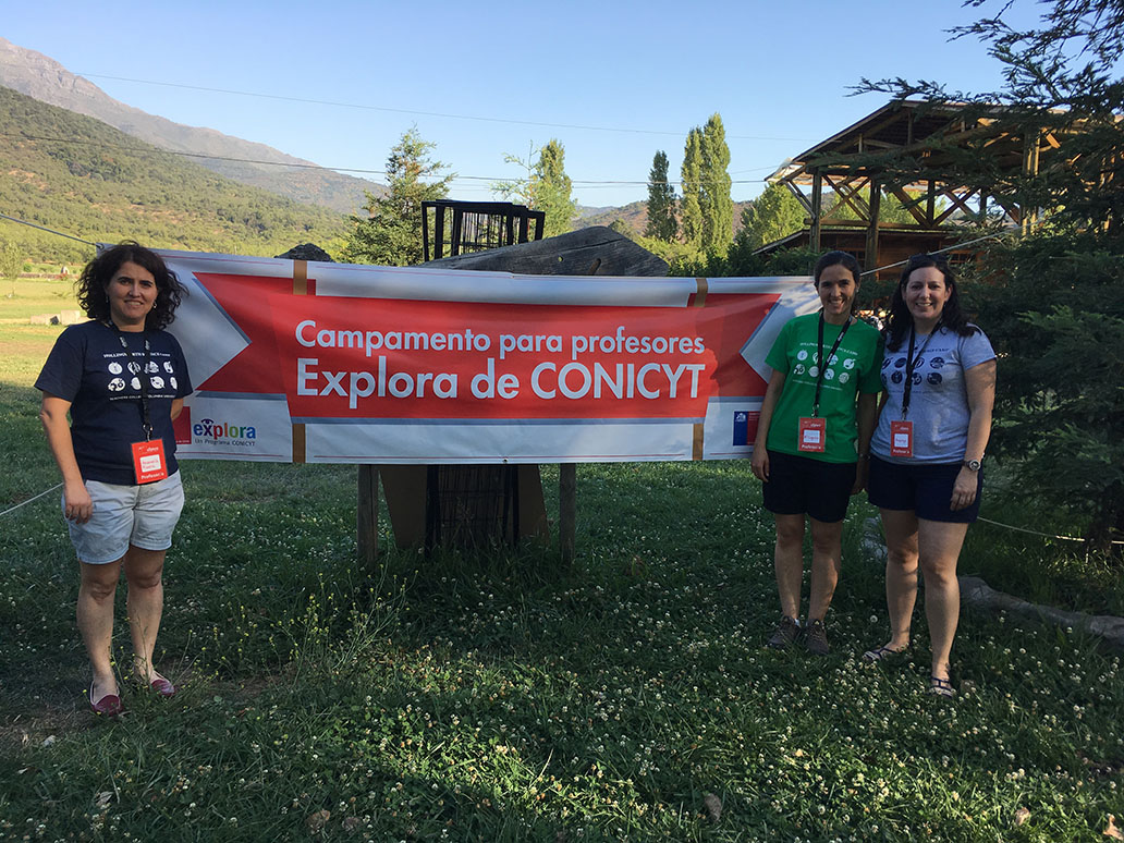 3 women standing in front of a 