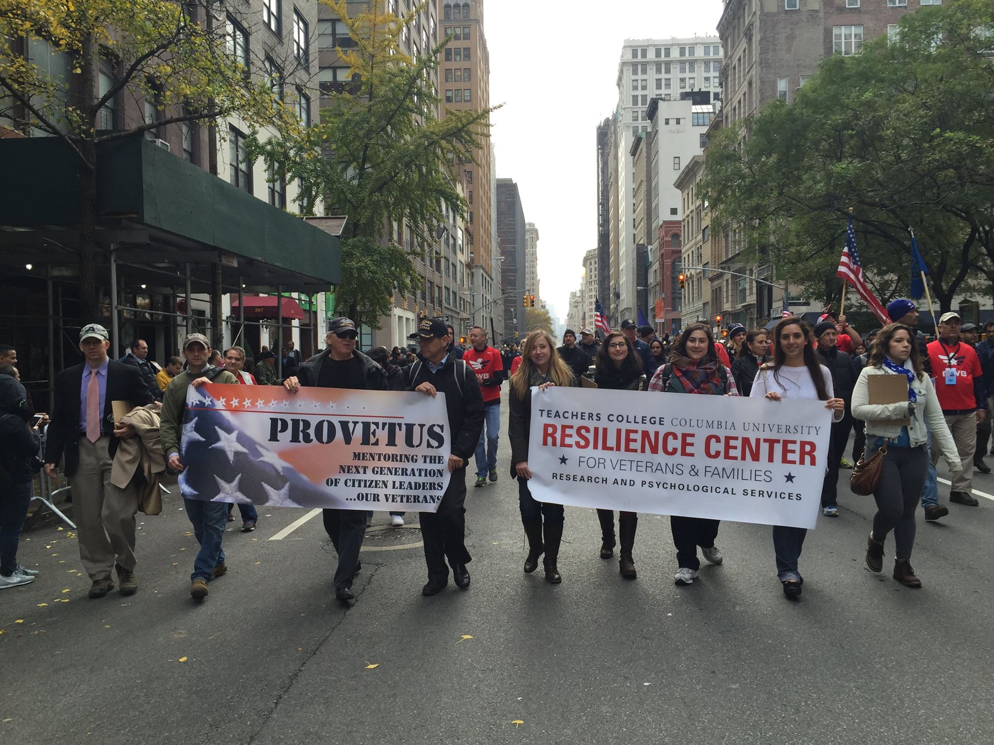 Walking with PROVETUS and Resilience Center banners