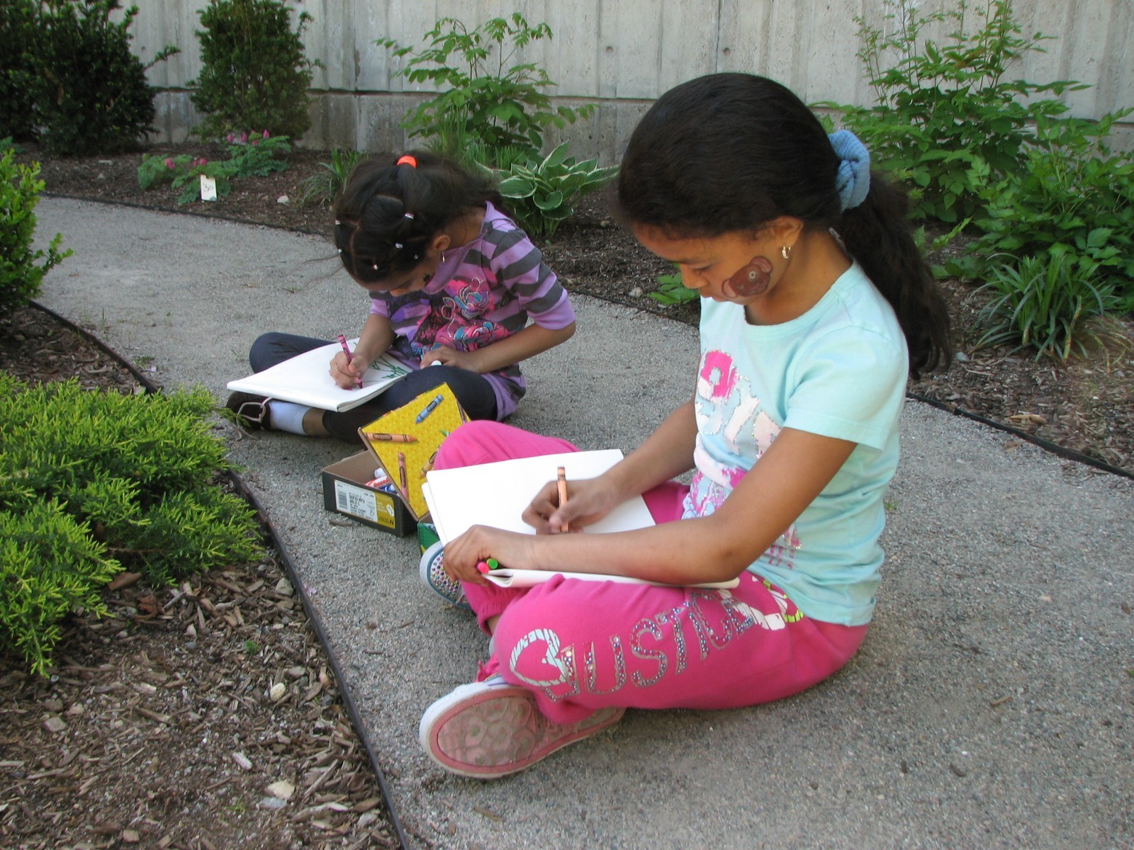 School Climate and Student Learning students outside drawing