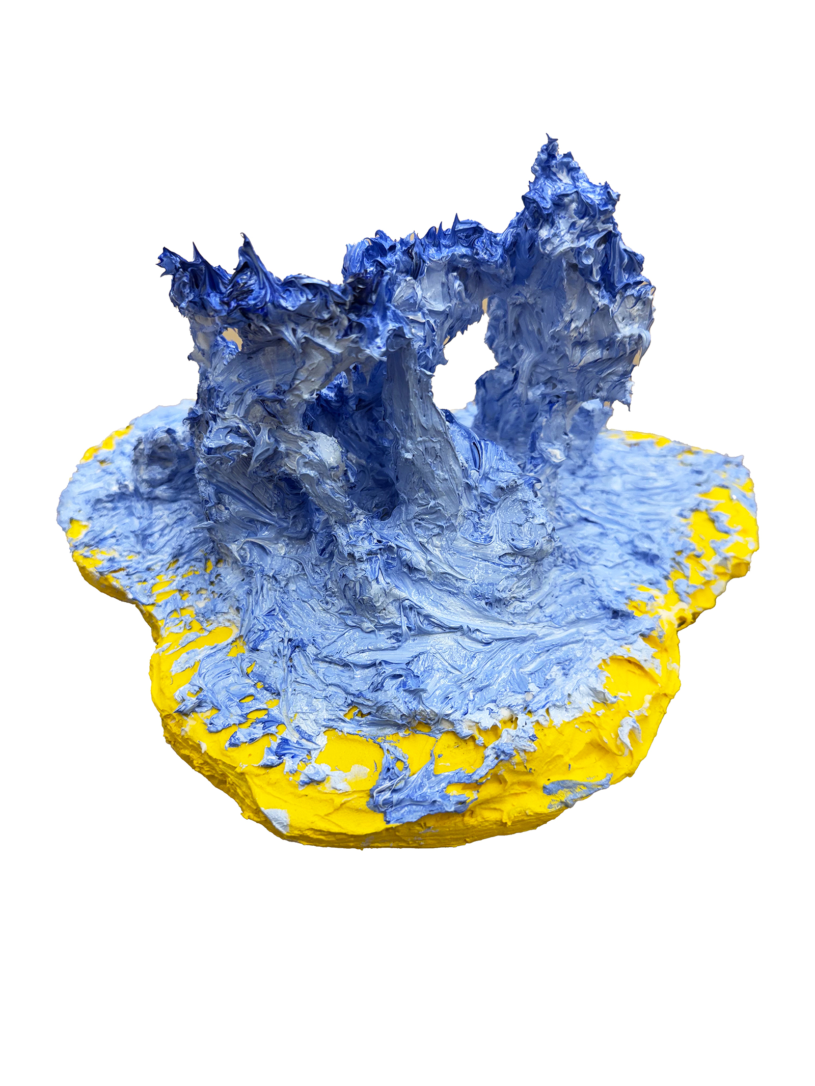 a sculptural piece made up of dried blue paint tones