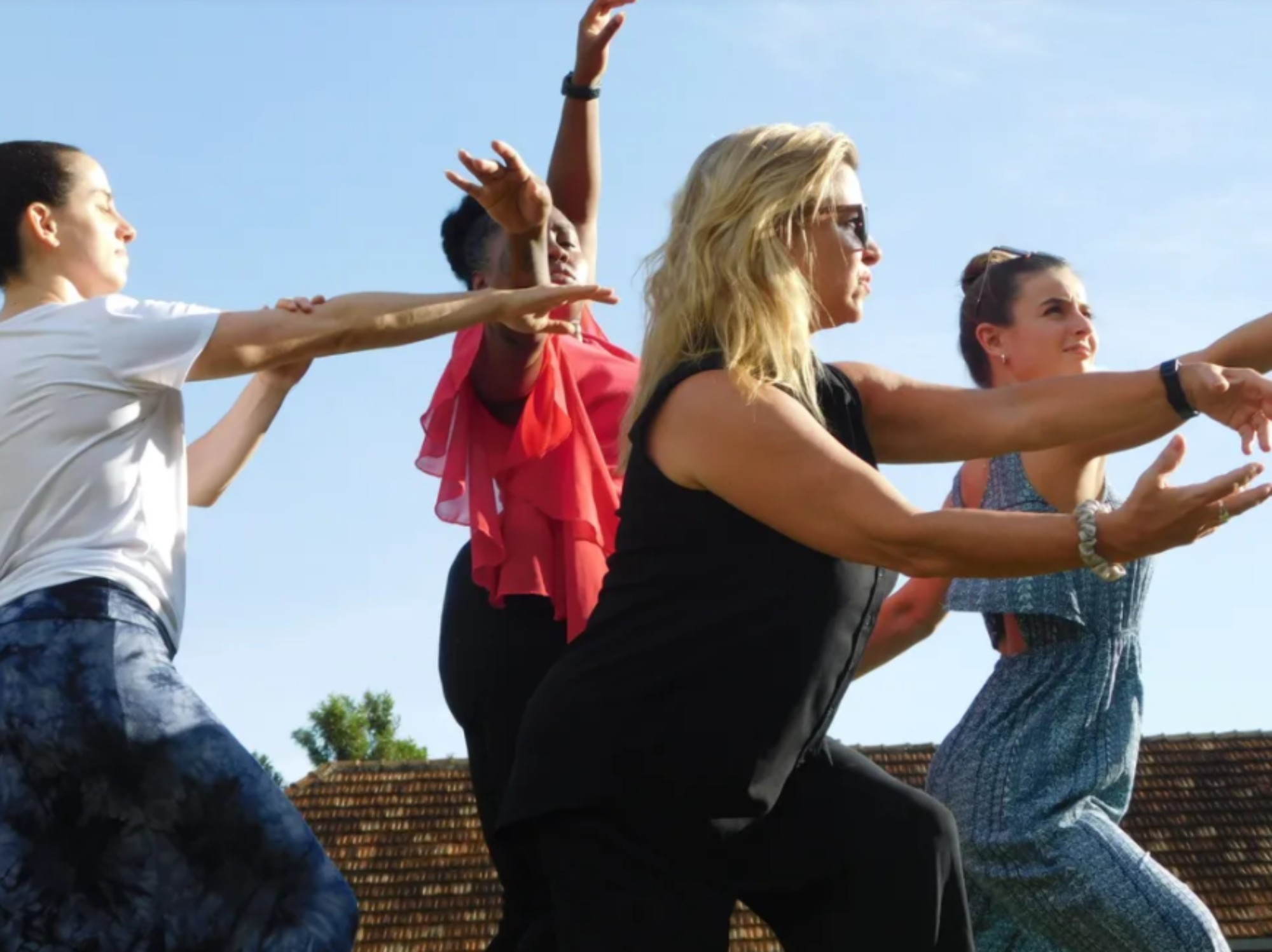 Close-up of a group of dancers outdoors