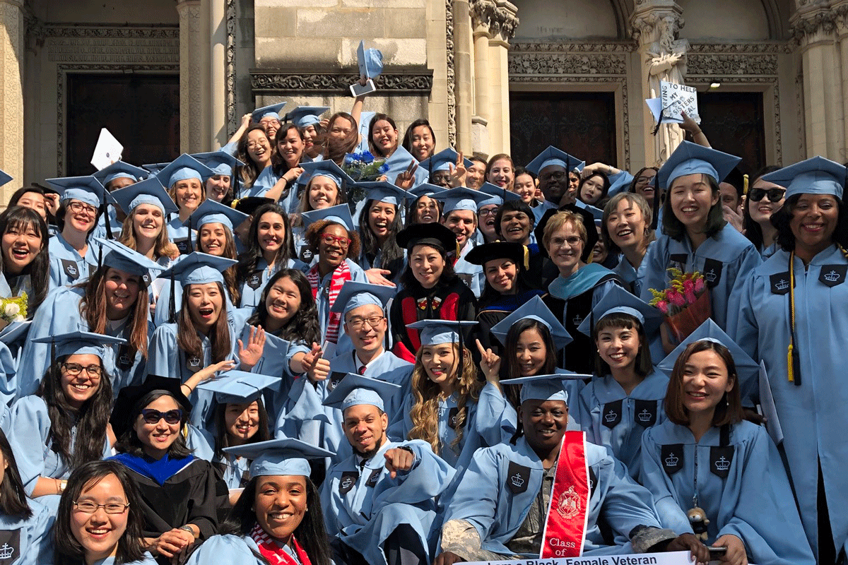 CMLTD graduates pose at graduation