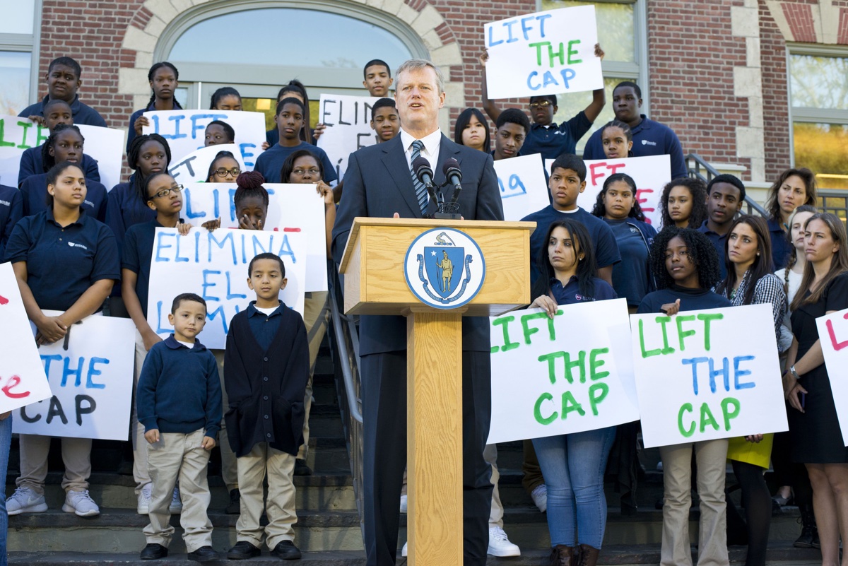 Charlie Baker speaks at a Massachusetts protest.