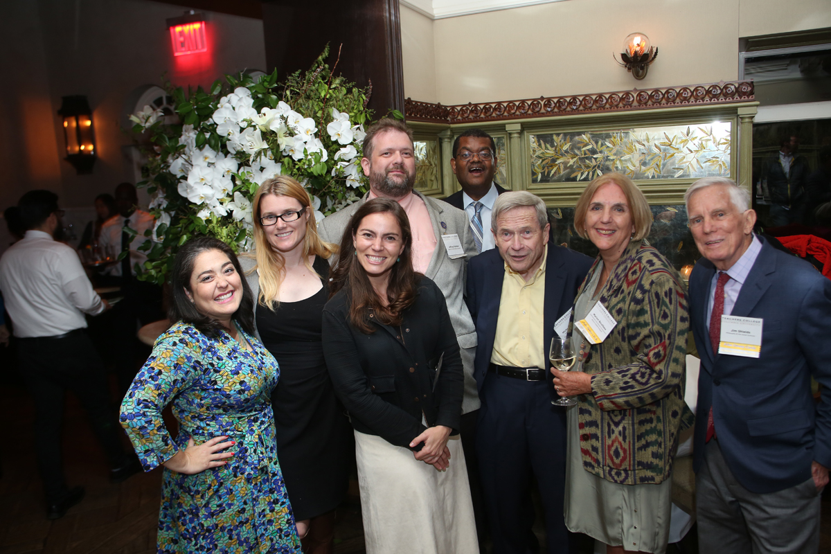 Rosella poses with alumni at Tavern on the Green