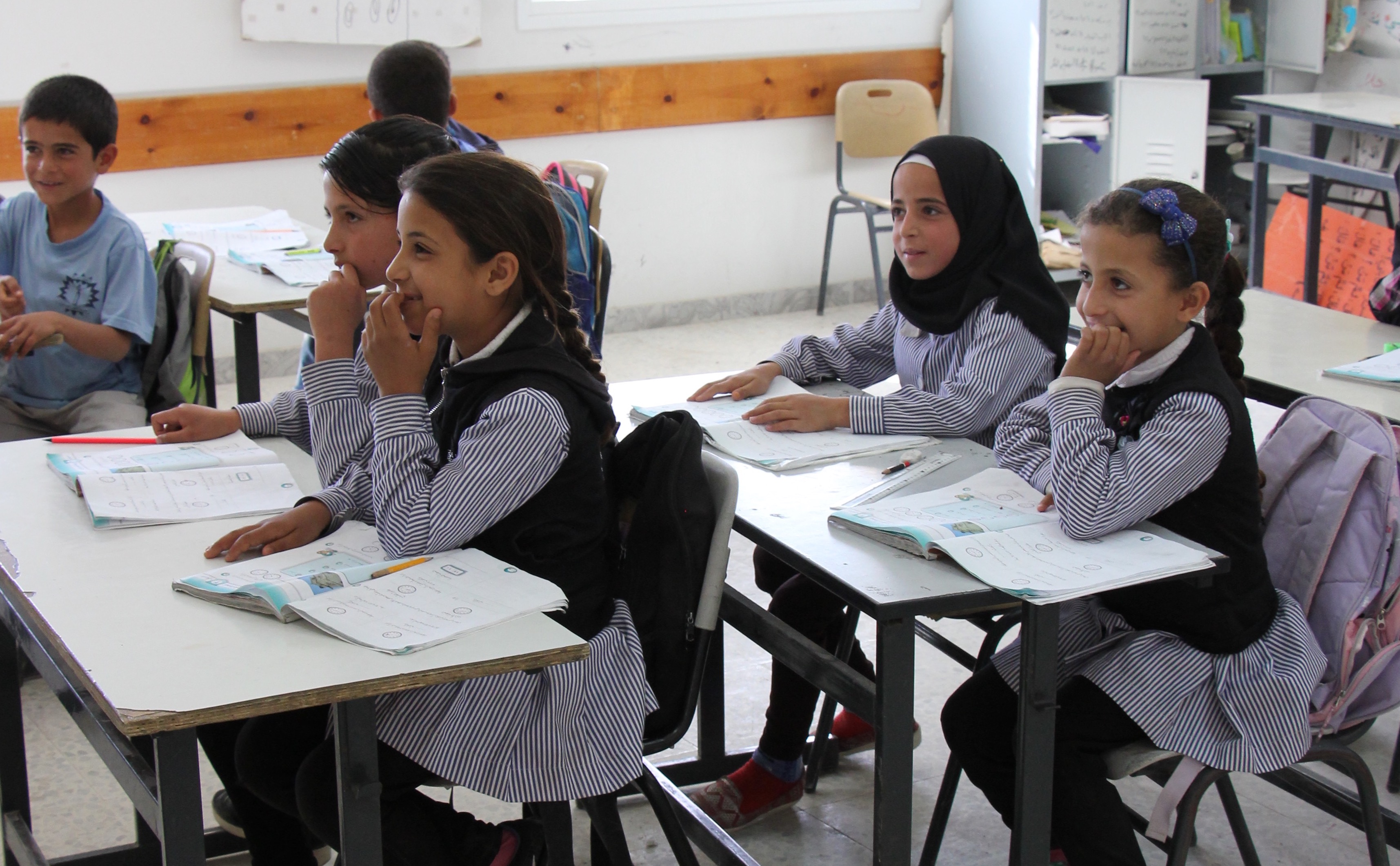 Image of students from Amber Webb research sitting in pairs in a classroom