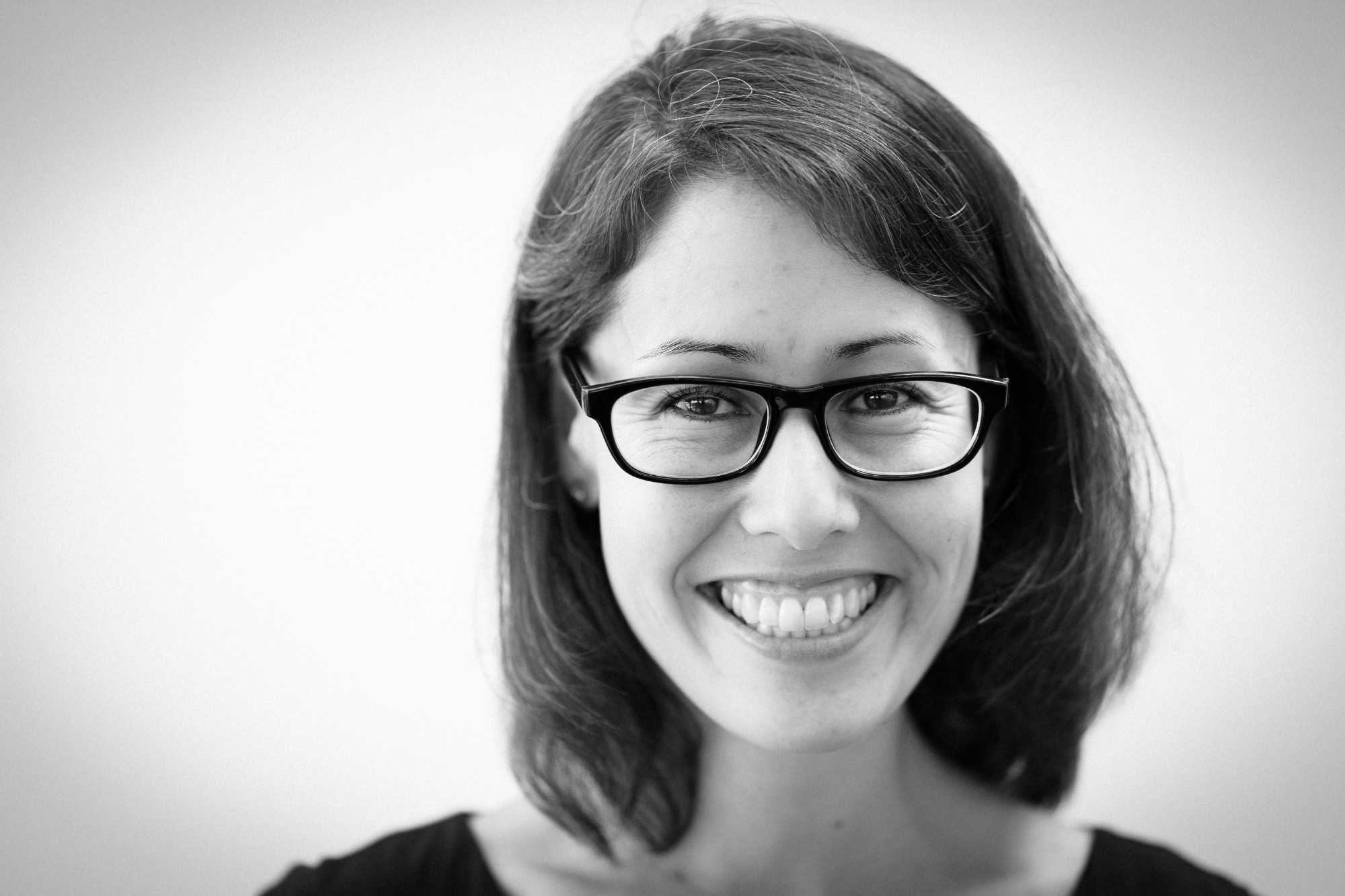 Woman smiling with glasses