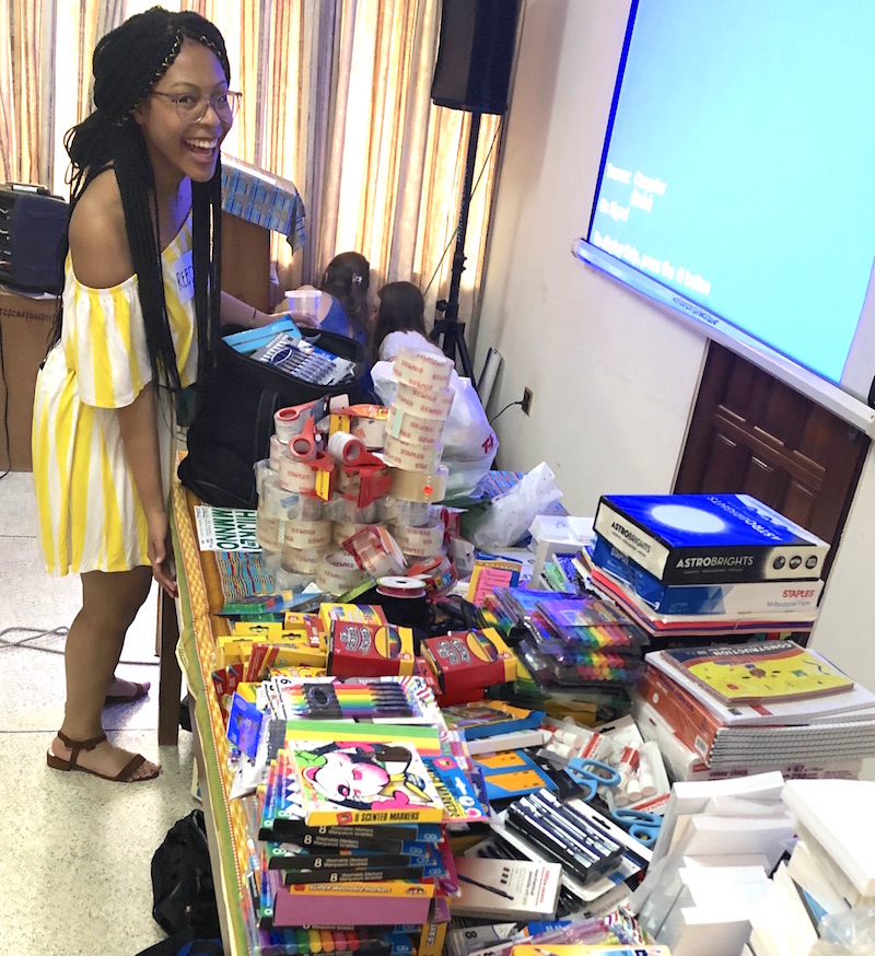 CSD student organizes the materials for the PD Retreat in Koforidua