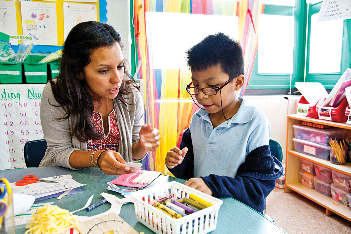 Teacher with a young student.