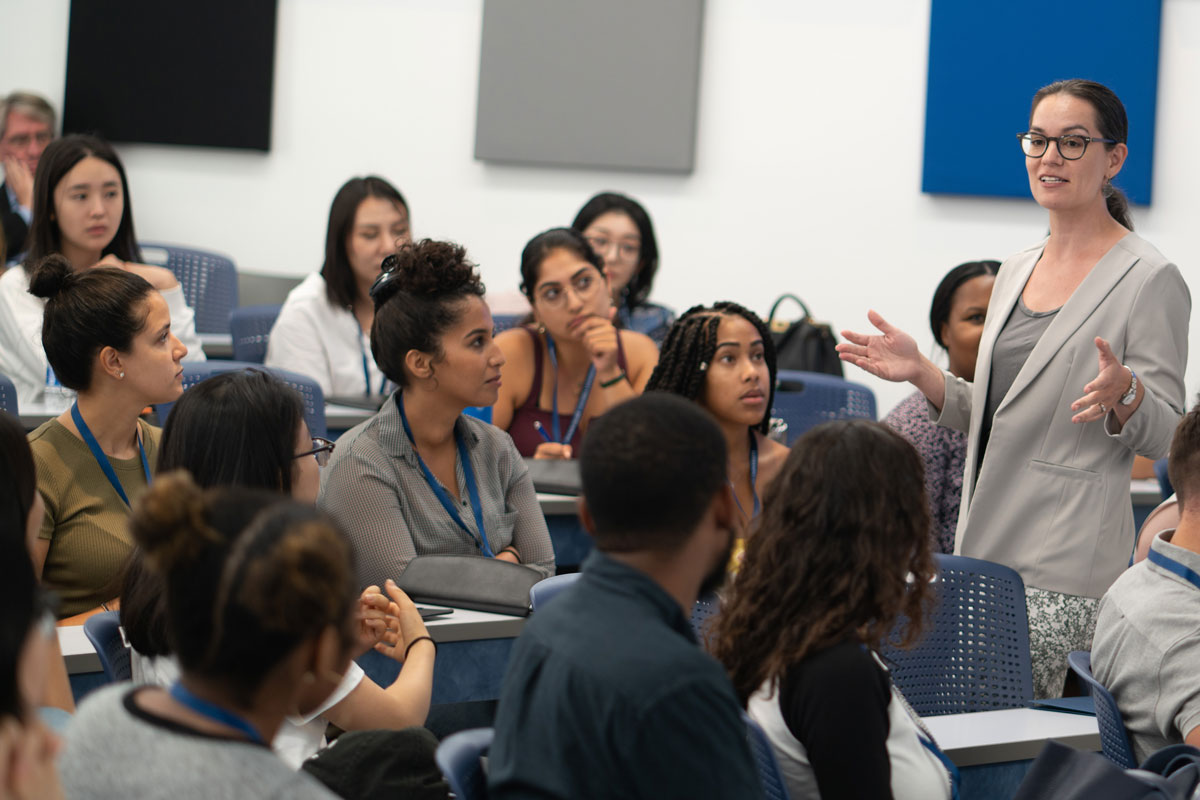 Graduate students attend a lecture at TC