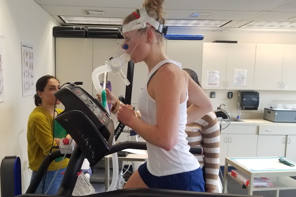 A student runs on a treadmill