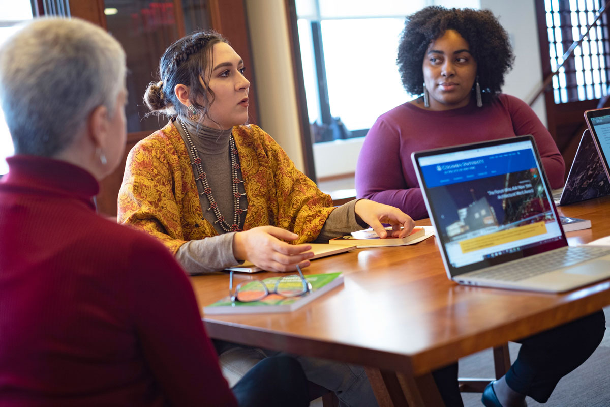 A group of students converse in a study group at Teachers College.