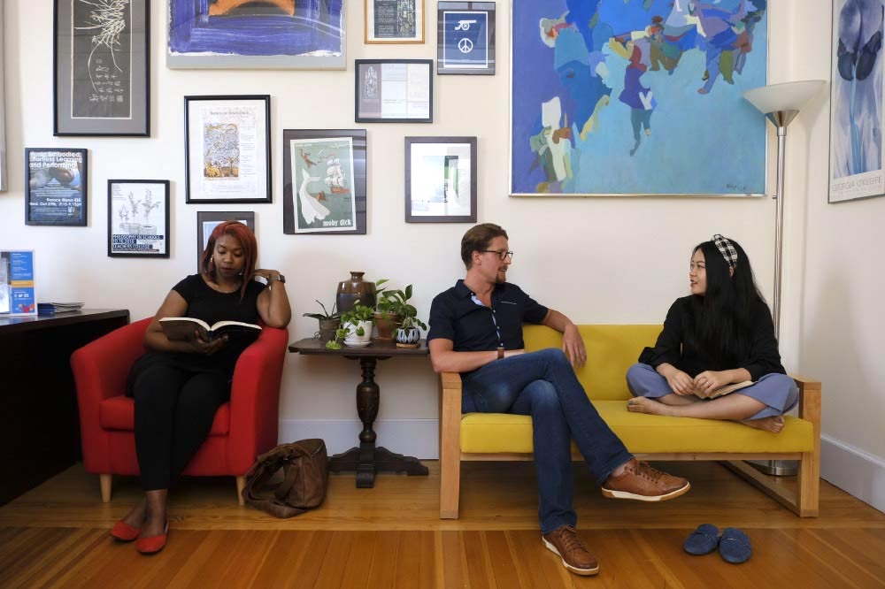 Students  memorizing and chatting in a faculty office