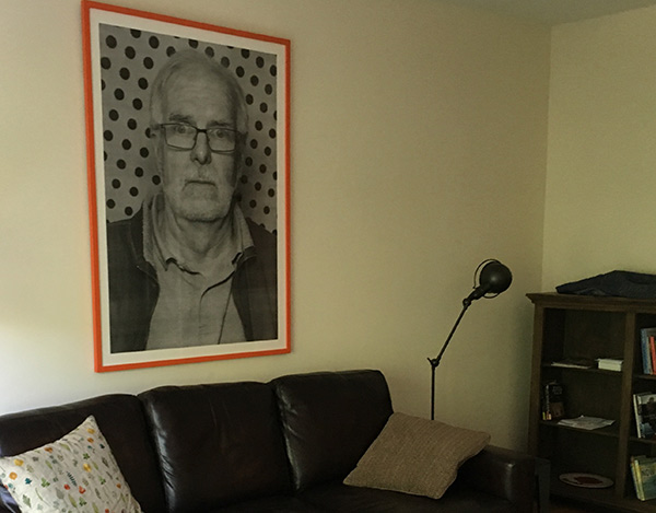 LOOMING LARGE As a joke, Browne sent colleague Erick Gordon a giant picture of himself. It now occupies a permanent spot over Gordon's sofa. Read Gordon's remembrance for the full story.