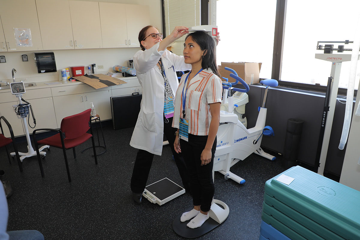 ExerT Clinic, Participant gets height taken