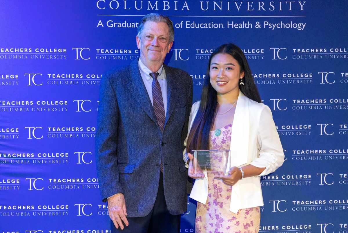 Student receiving the Shirley Chisholm Trailblazer Award.