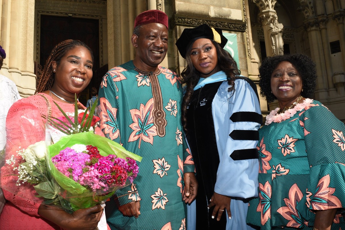 Graduates with parents after ceremony