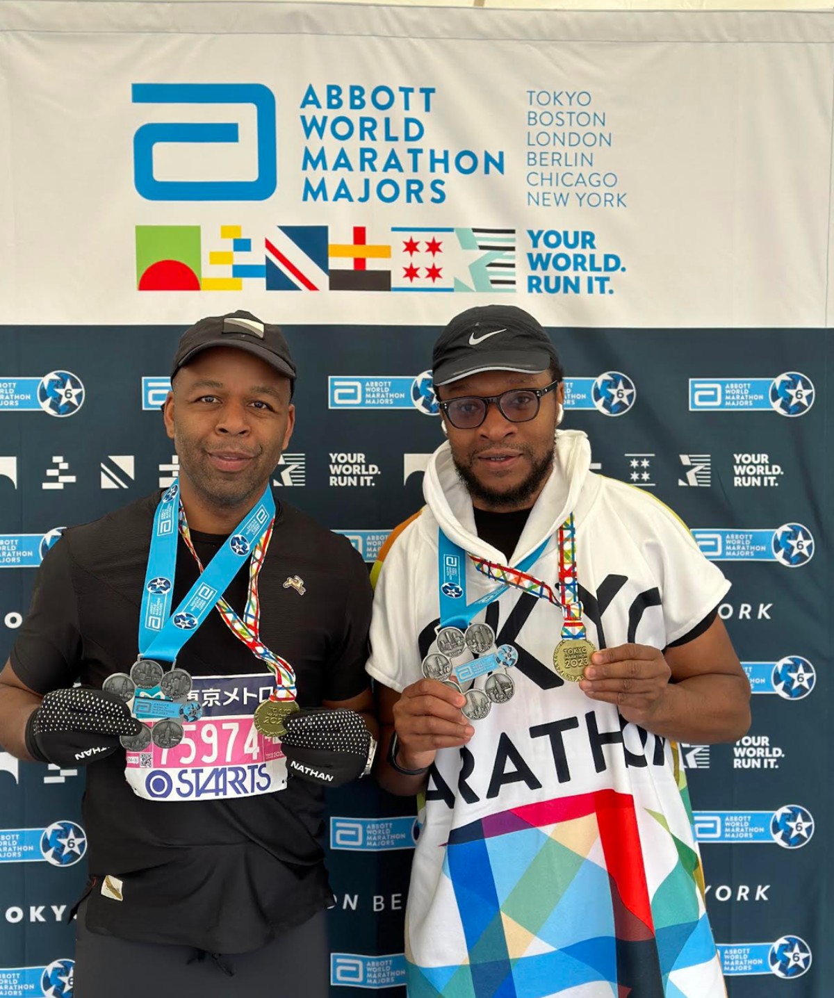 Charles Moore (left) successfully completed all of six the Abbott World Marathon Majors in 2023.
