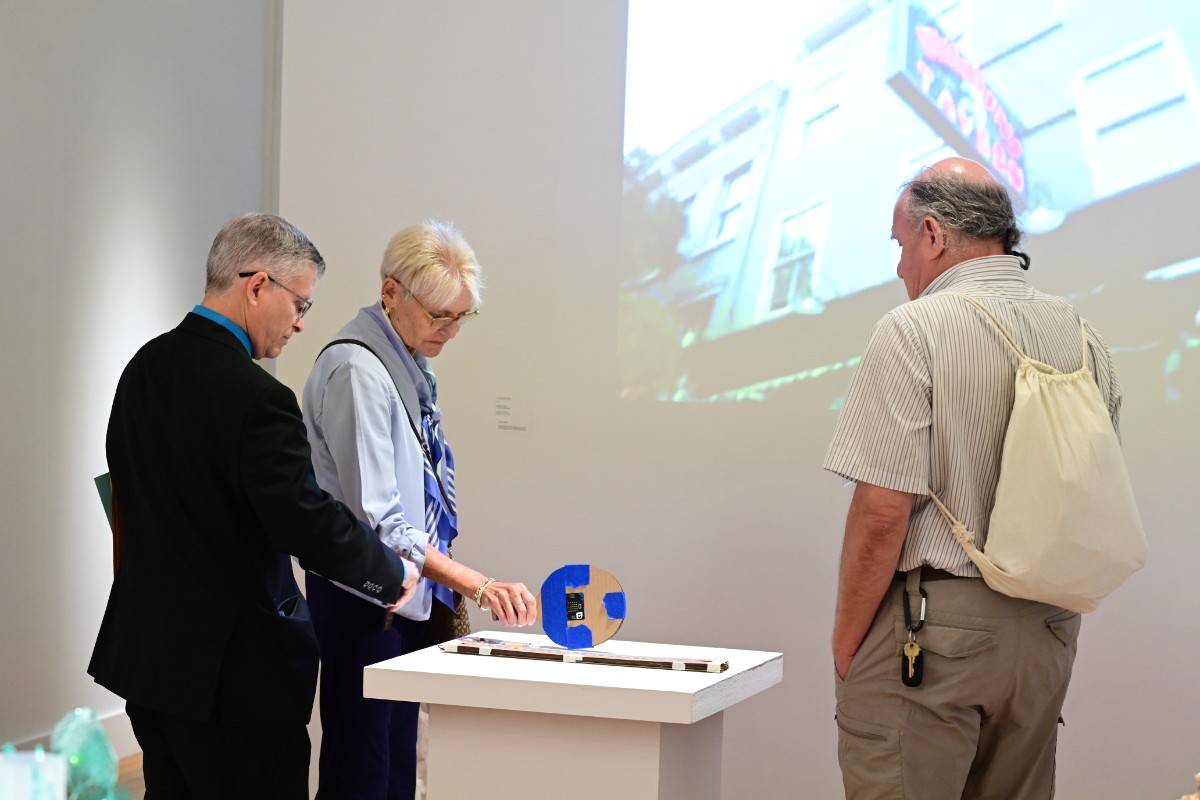 Alumni visit TC's Macy Art Gallery.