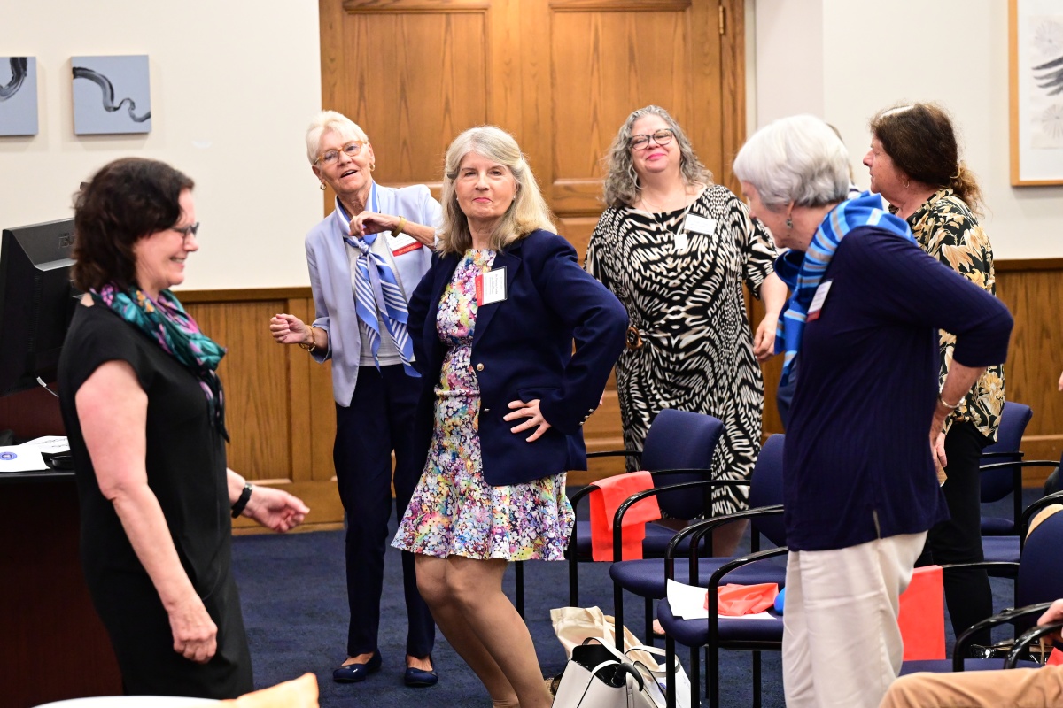 Carol Garber leads a dance break for alumni at the College's Silver Roundtable