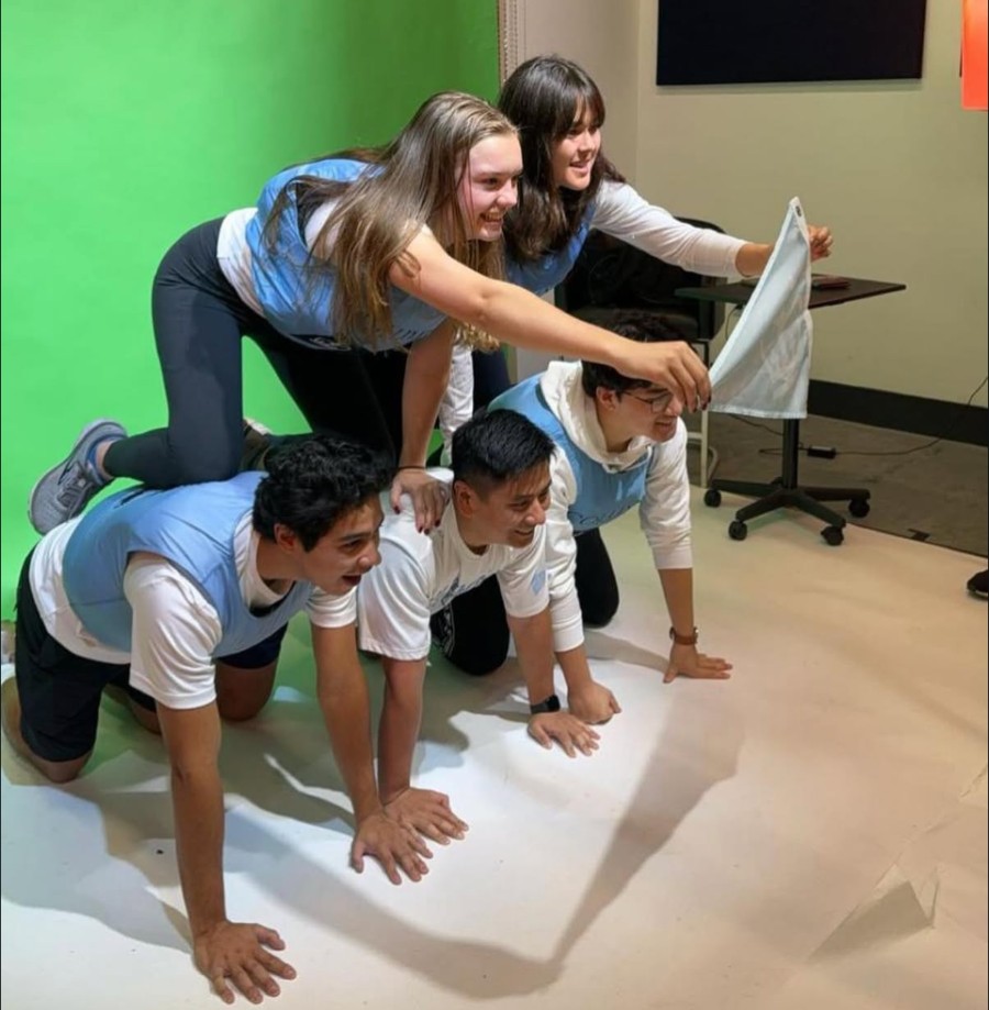 Pictured: Taking a pic for CU sailing team.