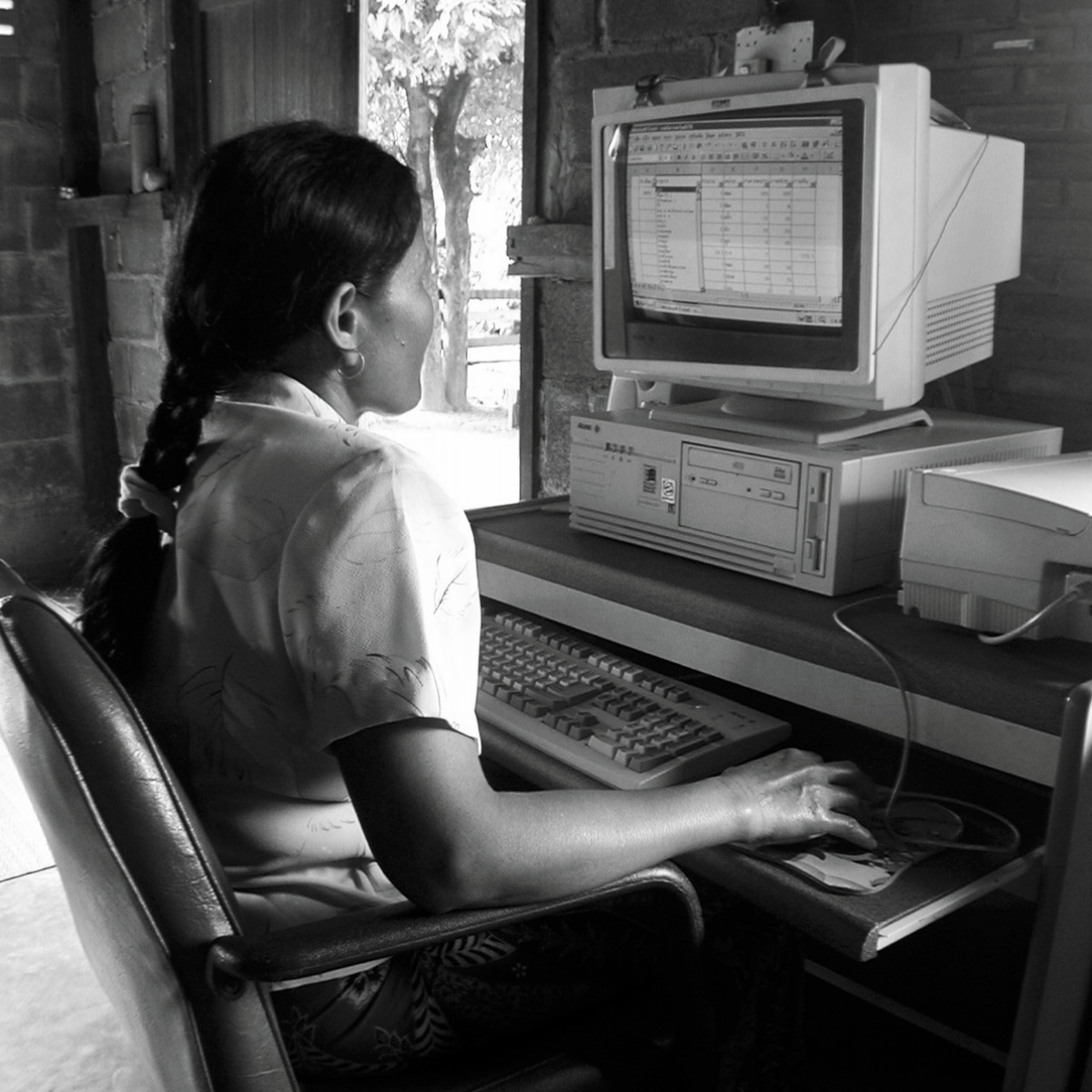 Thai girl at computer
