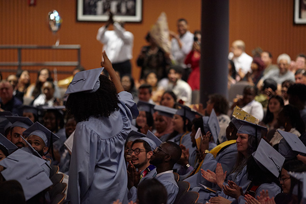 Graduate celebrate with family at the annual First Generation Ceremony