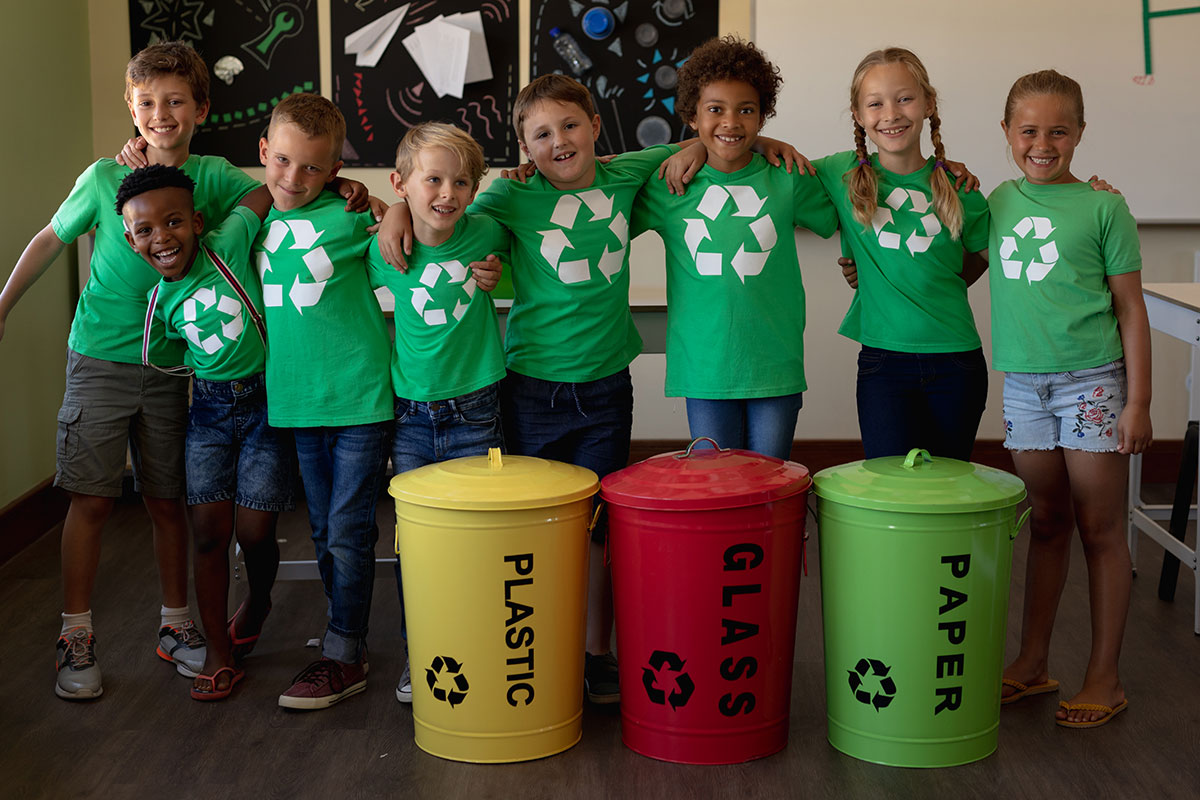 Students with recycling bins