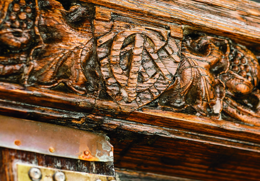 A TC medallion overlooking the entrance to Grace Dodge Hall from Russell Courtyard. In keeping with the leaf engravings, the Courtyard has a garden nowadays.